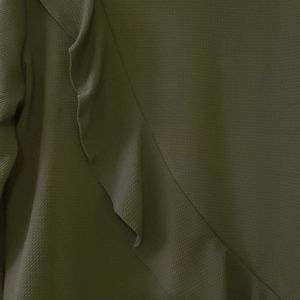 Green ruffle top